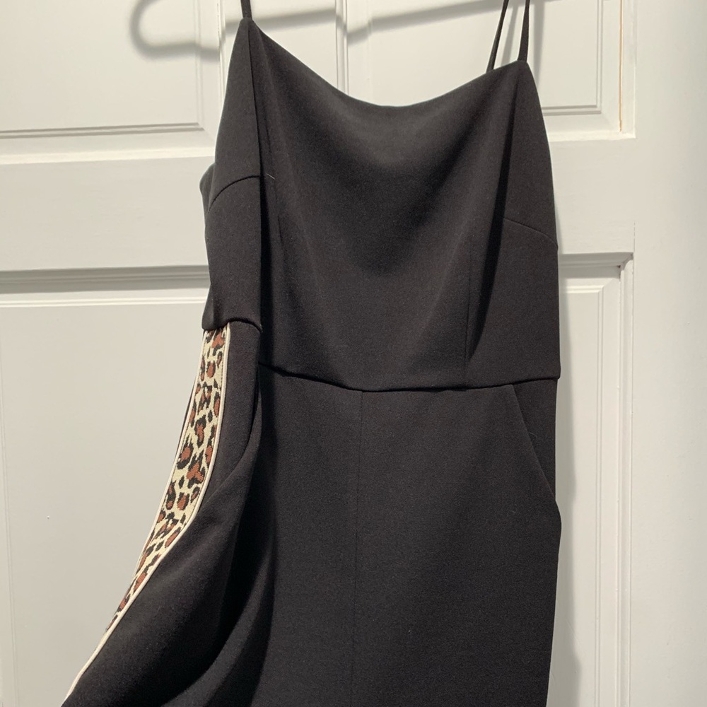 Quiet Storm black romper with cheetah print